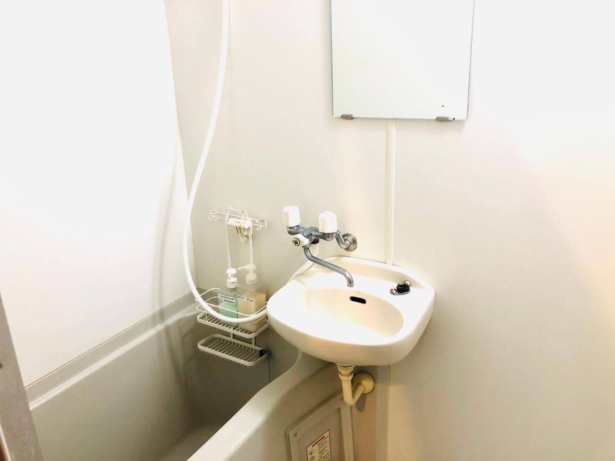エスポアール201 Aparthotel Kumamoto Bagian luar foto